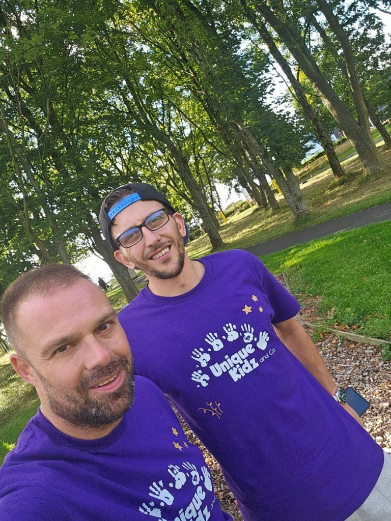 Tony and Josh wearing their Unique Kidz t-shirts